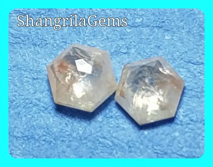 0.24ct 3.2mm pair Hexagon diamonds white with orange peach tint
