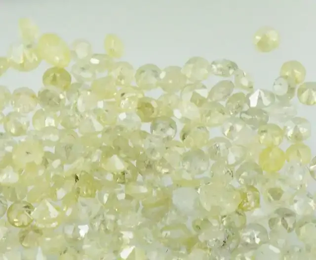 0.25ct light yellow champagne brilliant cut round 7 diamonds approx