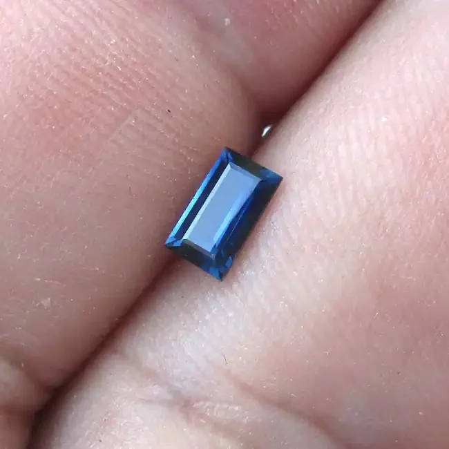 0.54cts Natural Australian Blue Sapphire Baguette Cut