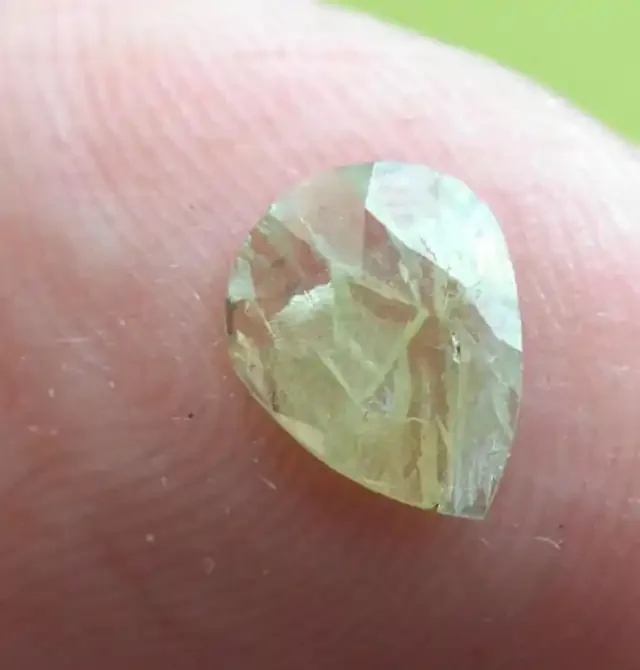 0.69ct 8.4mm Yellow diamond drop pear shape checker cut 8.4 by 6.6 by 1.5mm