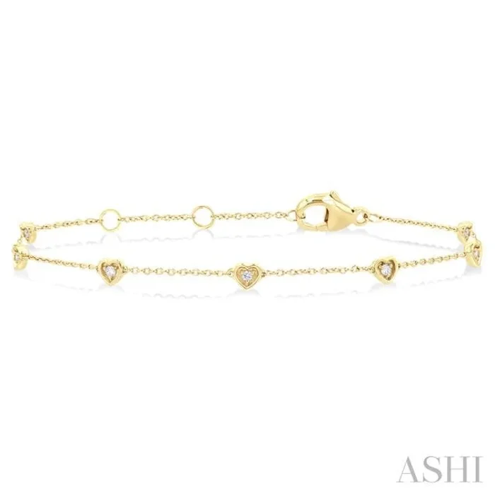 1/10 Ctw Petite Heart Round Cut Diamond Station Bracelet in 10K Yellow Gold