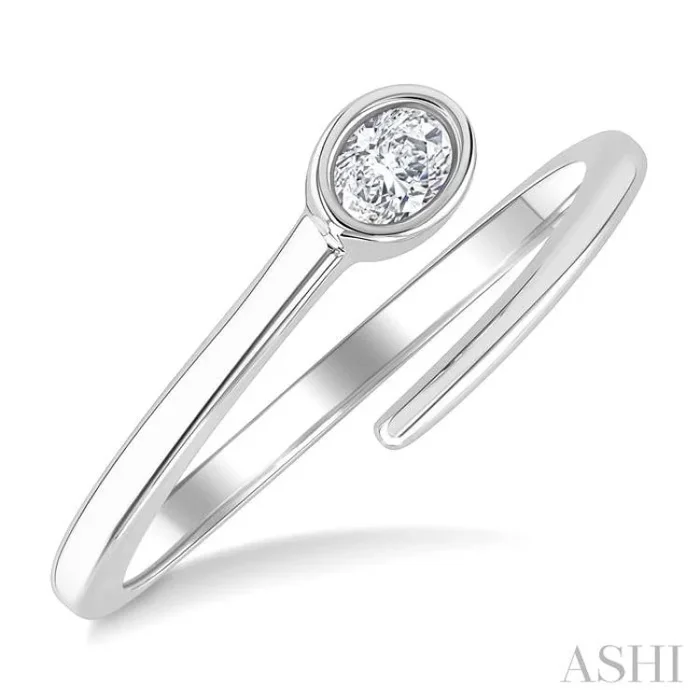 1/6 Ctw Bypass Bezel Set Oval Cut Diamond Open Fashion Ring in 14K White Gold