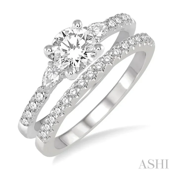 1 Ctw Round & Pear Cut Diamond Wedding Set With 7/8 Ctw Engagement Ring and 1/8 Ctw Wedding Band in 14K White Gold