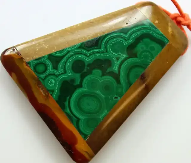 107.40 CTS INTARSIA MALACHITE EYE LIKE RINGS MOOKAITE SIDES
