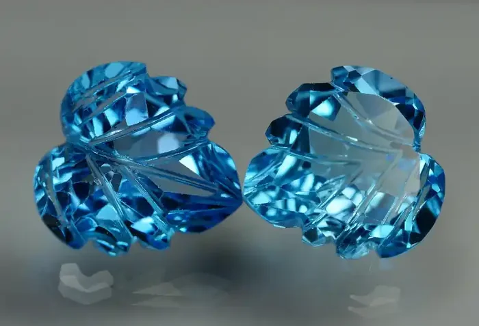 11.085 CRT LOVELY SWISS BLUE TOPAZ CARVING-