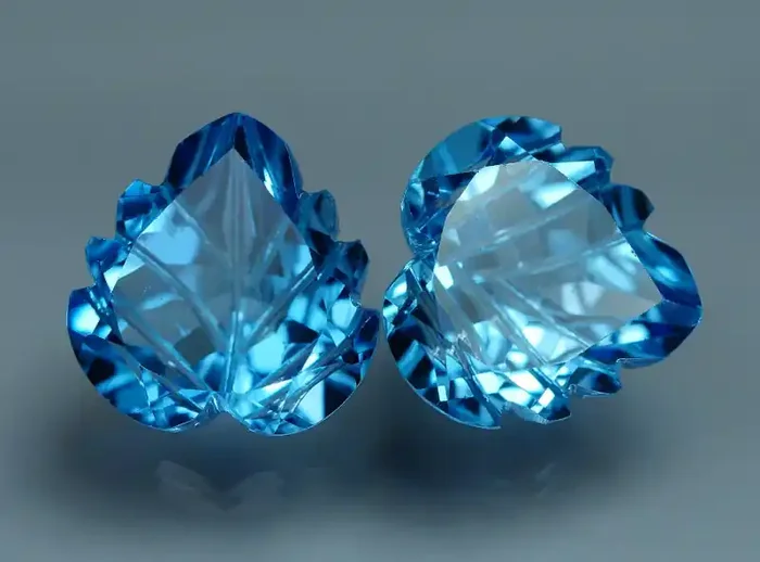 11.150 CRT LOVELY SWISS BLUE TOPAZ CARVING-
