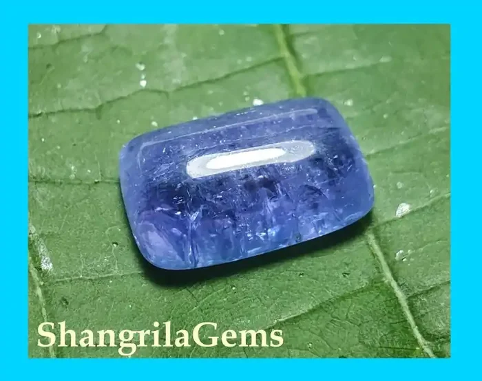 14mm 8.45ct Tanzanite cabochon sugar loaf oblong 14 by 9 by 6mm