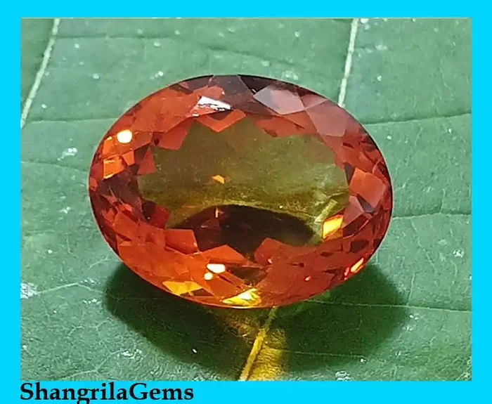 16.2mm oval Madeira Citrine rich deep orange red 16.2 by 13.4 by 9mm 11.8ct