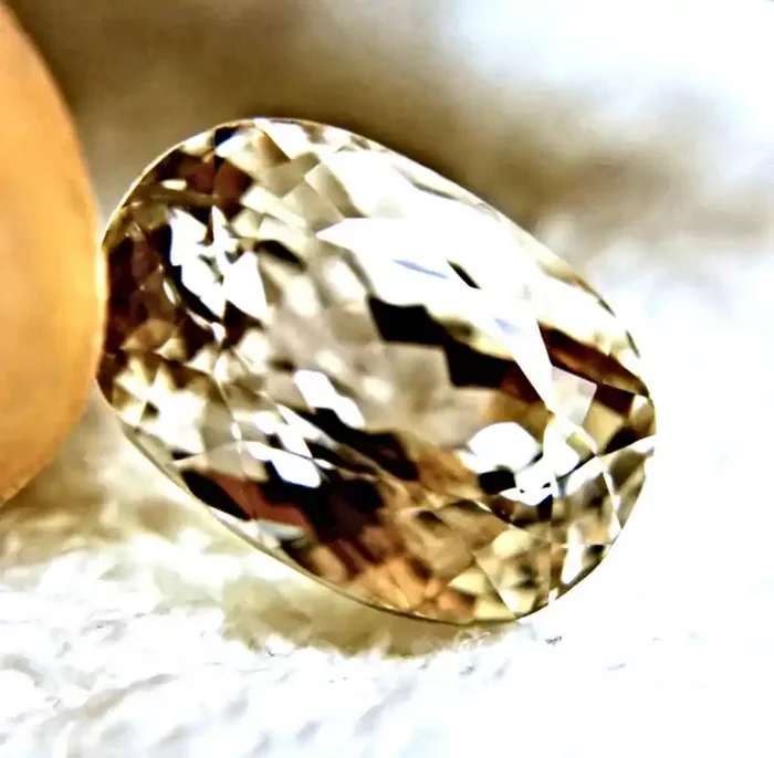 21.64 Carat VVS1 South American Golden Yellow Triphane – Superb