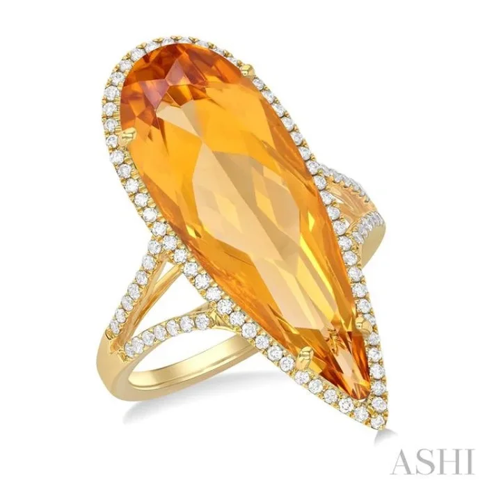 26×9 MM Pear Shape Citrine and 1/3 Ctw Round Cut Diamond Halo Semi-Precious Ring in 14K Yellow Gold