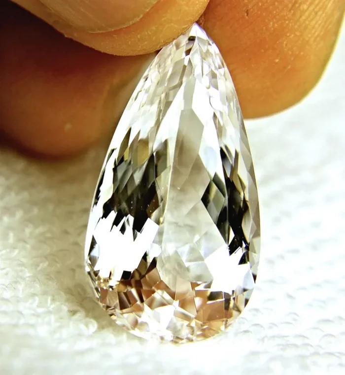 30.4 Carat Near White VVS Spodumene – Gorgeous