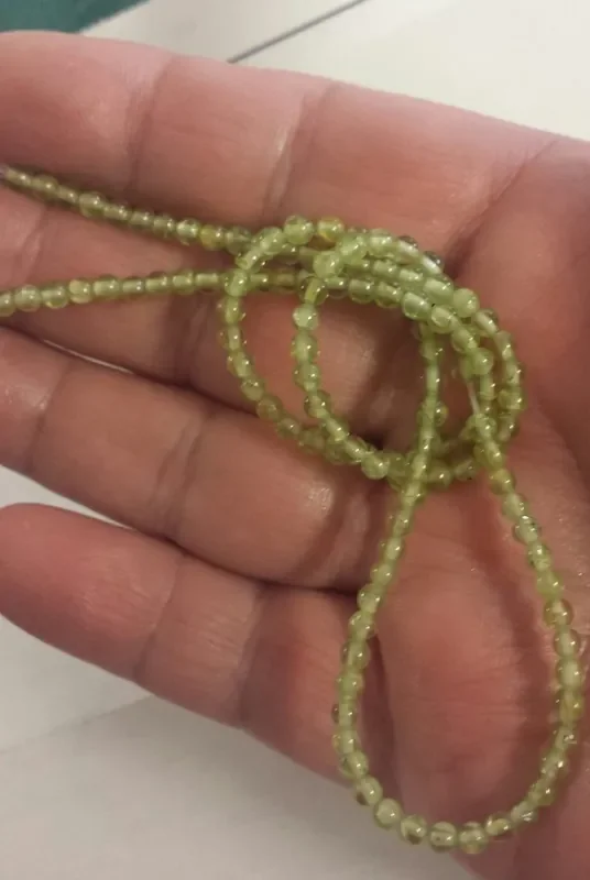 30 CTW PERIDOT BEAD STRAND 15 INCH GREEN BEAUTIES.