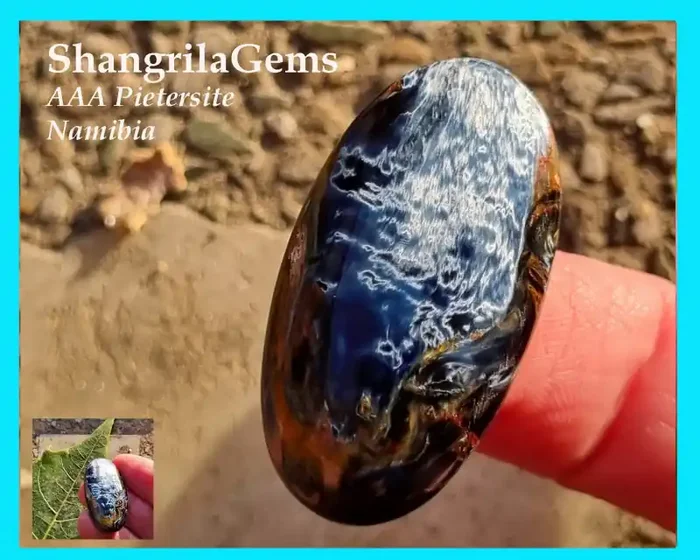 35.5mm Pietersite Gold Blue Red oval cabochon AAA grade from Namibia