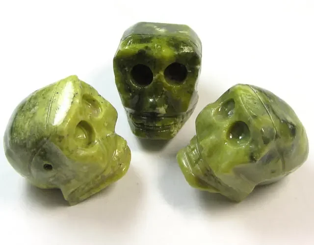 350 CTS THREE JASPER SKULL CARVING AGR 370