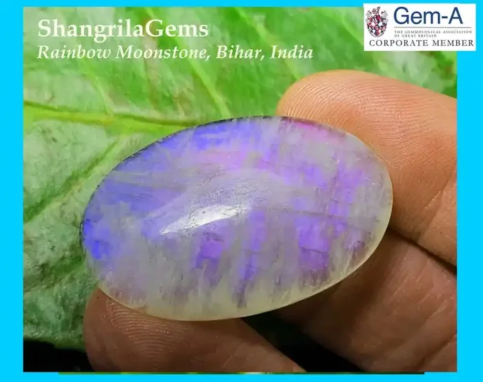 35mm 34ct rainbow moonstone oval cabochon 35 by 22 by 5mm