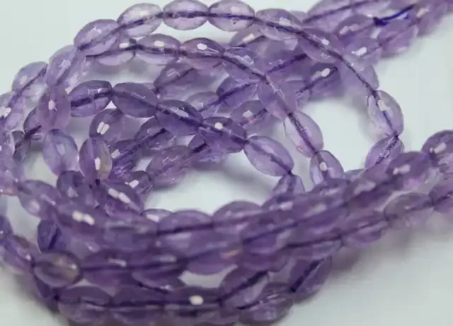 380CTS- 3STRAND AMETHYST FACETED 10 X 7 MM 16 INCH + CLASP