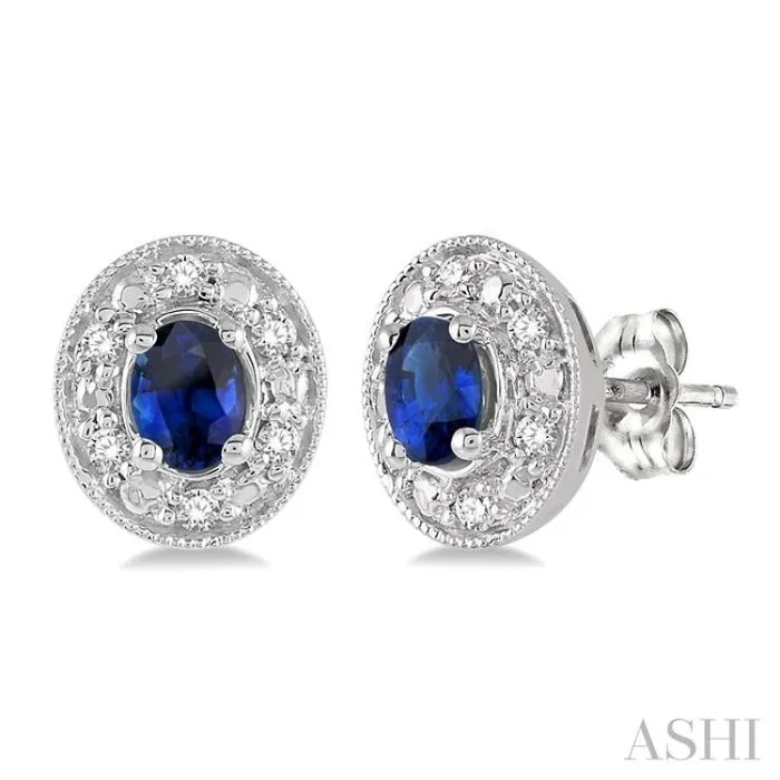 4×3 MM Oval Shaped Sapphire and 1/10 ctw Single Cut Diamond Earrings in 14K White Gold