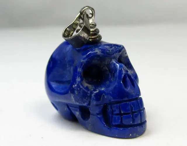 40 CTS RUTILATED SKULL PENDNAT MGMG278