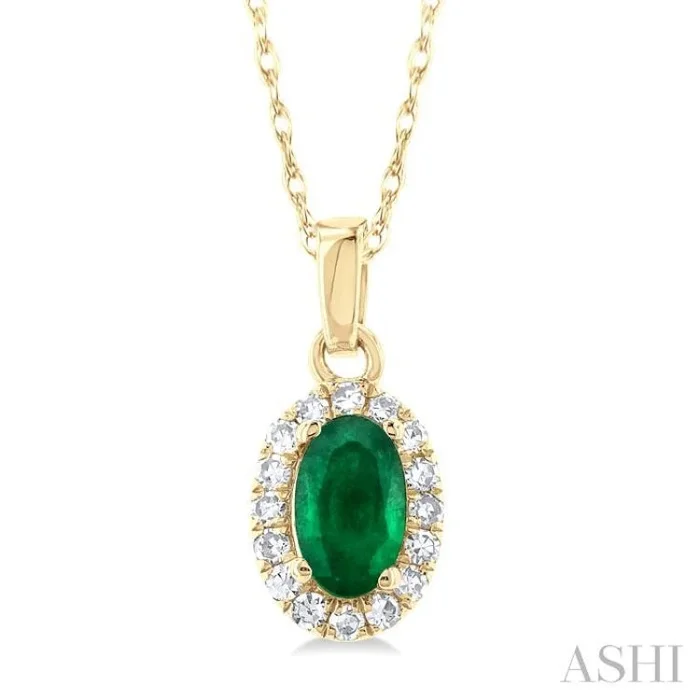 5×3 MM Oval Shape Emerald and 1/20 Ctw Single Cut Diamond Halo Precious Pendant with Chain in 10K Yellow Gold