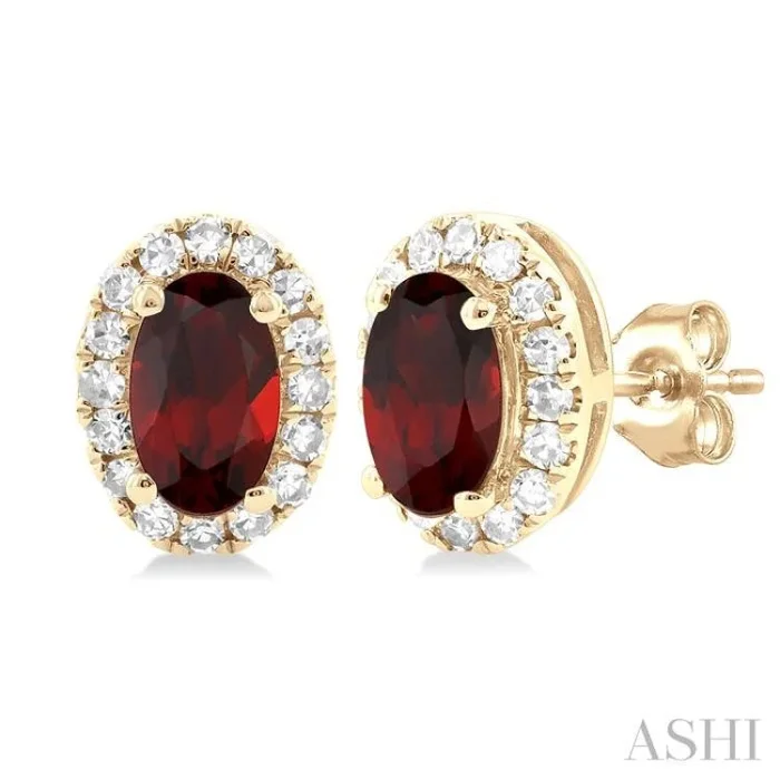 5×3 MM Oval Shape Garnet and 1/8 Ctw Single Cut Diamond Halo Semi-Precious Stud Earrings in 10K Yellow Gold