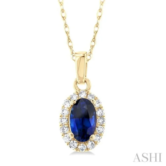 5×3 MM Oval Shape Sapphire and 1/20 Ctw Single Cut Diamond Halo Precious Pendant with Chain in 10K Yellow Gold