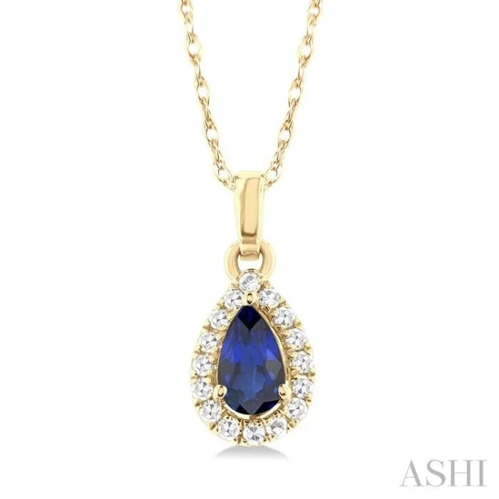 5×3 MM Pear Shape Sapphire and 1/20 Ctw Single Cut Diamond Halo Precious Pendant with Chain in 10K Yellow Gold