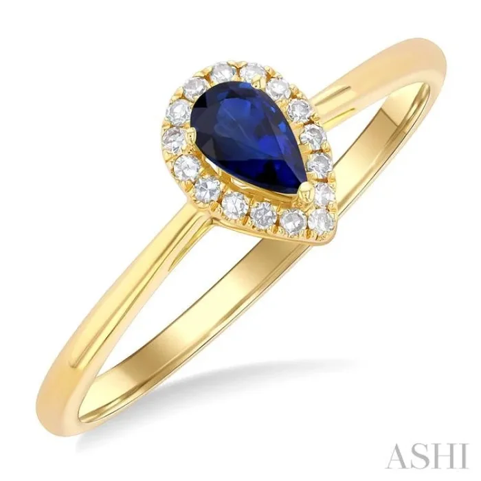 5×3 MM Pear Shape Sapphire and 1/20 Ctw Single Cut Diamond Halo Precious Ring in 10K Yellow Gold