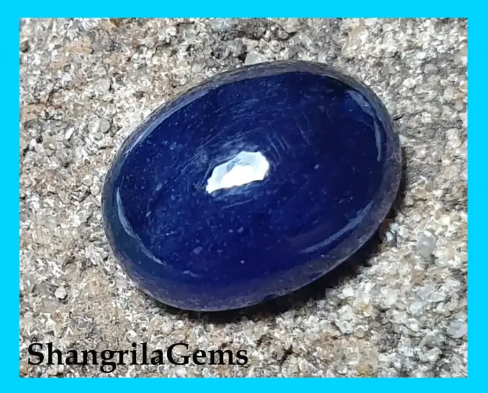 5.2ct 10.9mm oval blue SAPPHIRE cabochon heat only treatment