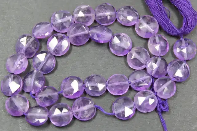 51.55 CTS FACTED AMETHYST BEADS 32 PIECES