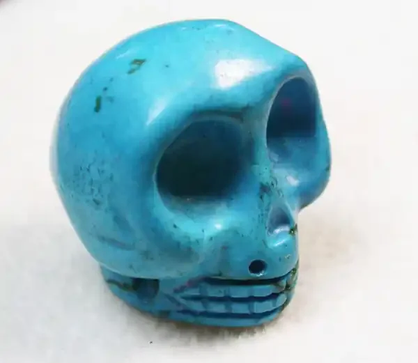 54.50 CTS TURQUOISE LIKE SKULL CARVING [MGW148]