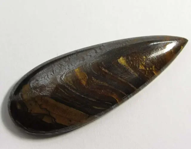 61.8CTS BRIGHT VEINED TIGER EYE GG 81