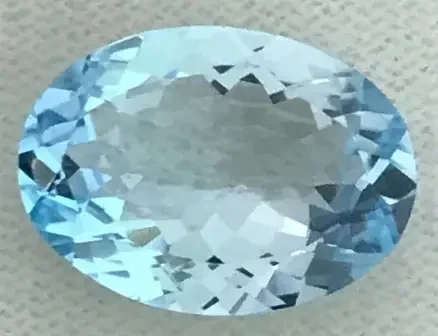 7.95 ct Oval Sea Blue Topaz – VVS – B24 F66