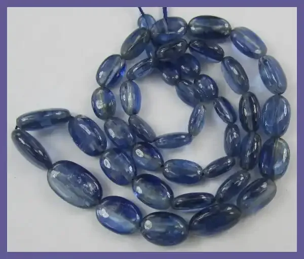“AAA KYANITE 5X7-9X11MM SMOOTH OVAL BEADS FROM NEPAL-SUPERB!!”