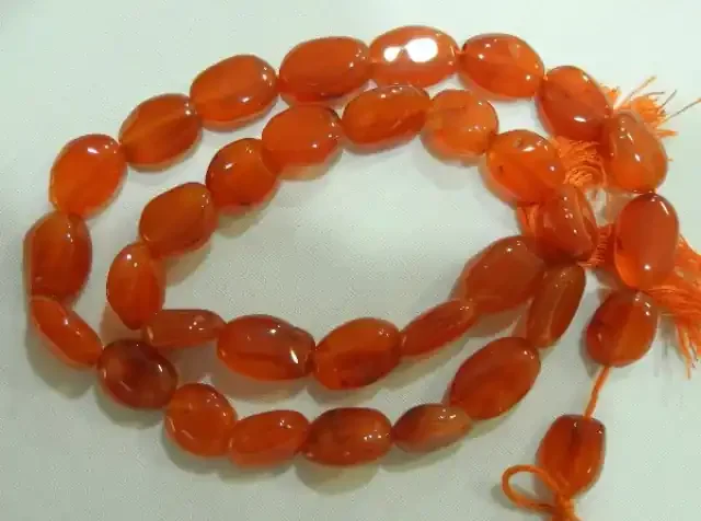 “BBB GRADE CARNELIAN FLAT OVAL BEAD STRAND-BEAUTIFUL!!”