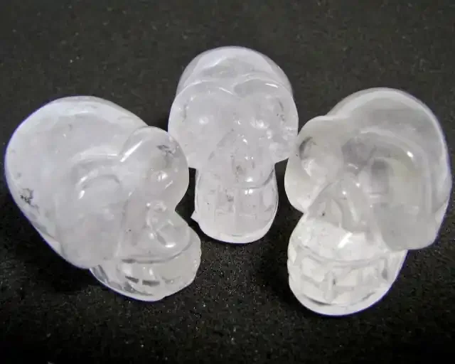 900CTS THREE QUARTZ CRYSTAL SKULL CARVING AGR 507