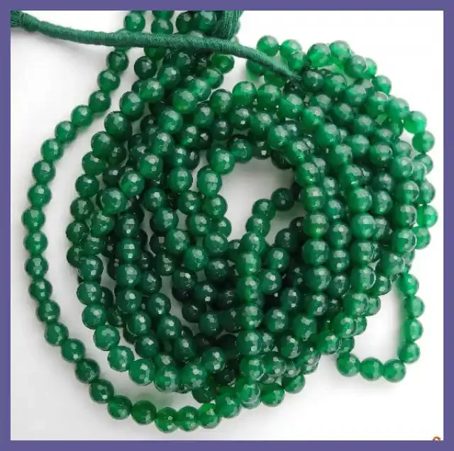 AA 6.00MM TRANSLUCENT GREEN ONYX ROUND FACETED BEAD STRAND