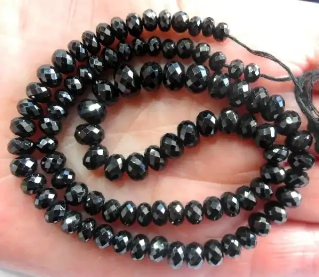 AAA SUPERB MICRO-FACETED SPINEL ROUNDEL BEAD STRAND