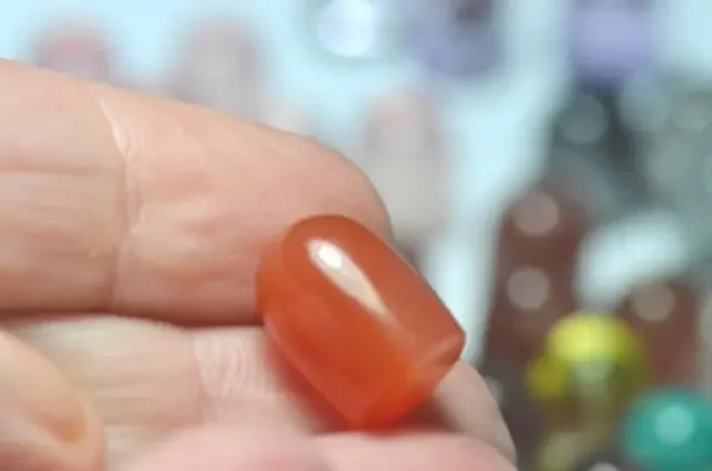 Carnelian Bullet shape gemstone cabochon 14mm by 10mm