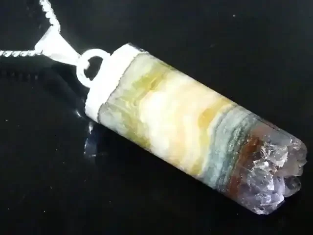 CHARACTER TUBULAR AMETHYST ON ROCK BASE PENDANT AG940