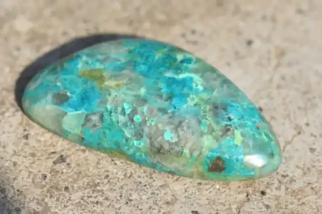 Chrysocolla turqoise color 42mmm 44ct designer trillion cabochon