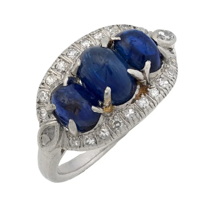 Edwardian 3.20 carat cabochon cut sapphire diamond platinum 3 stone ring
