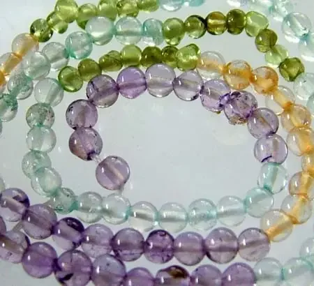 FOUR DIFERENT COLOURFUL STONES IN STRAND 25.15 CTS GT 1621