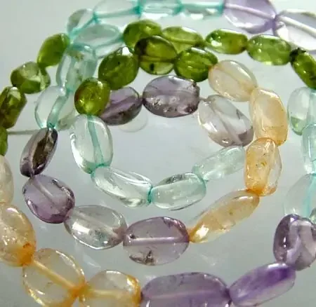 FOUR DIFERENT COLOURFUL STONES IN STRAND 72.00 CTS GT 1608