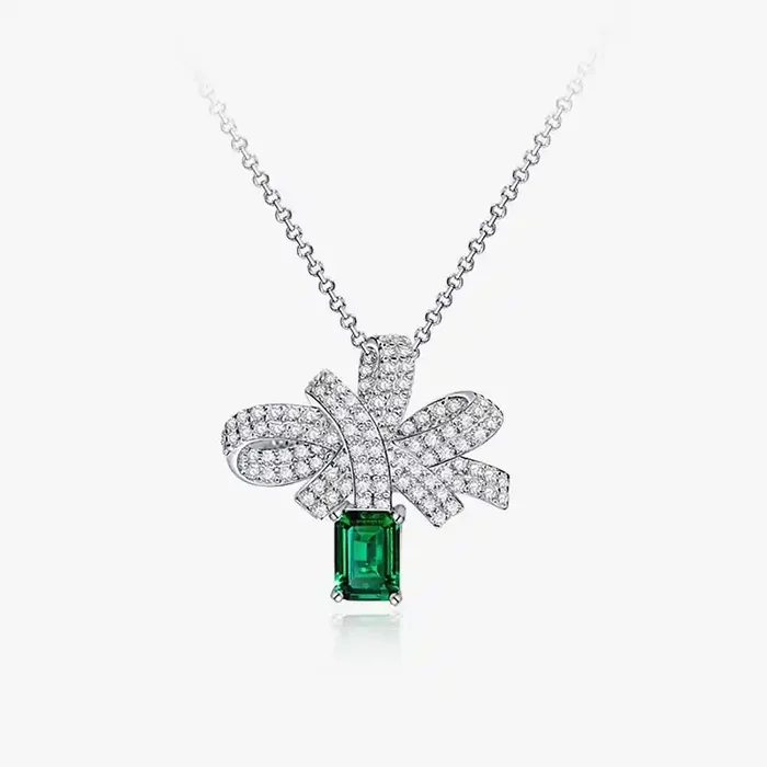 Helloice Micro Paved Bowknot with Green Emerald Cut Pendant in Sterling Silver