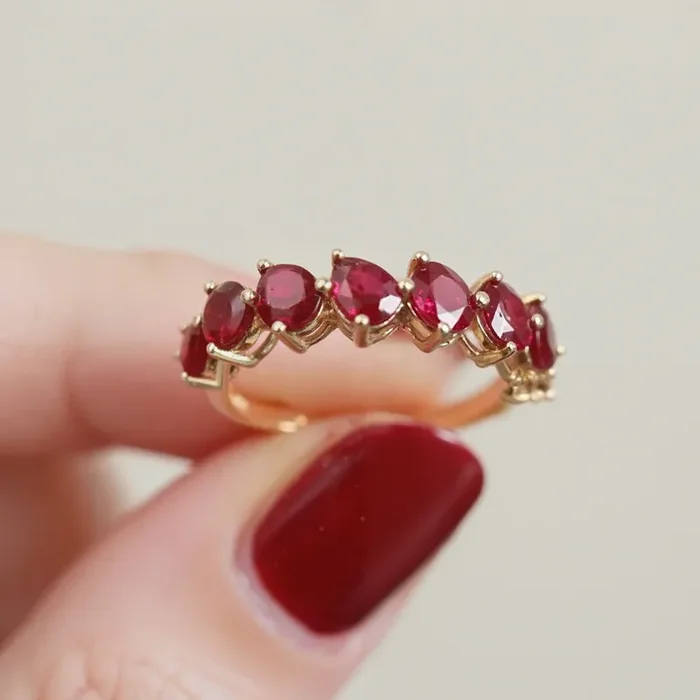 Helloice S925 Silver Pear Cut Ruby Eternity Band