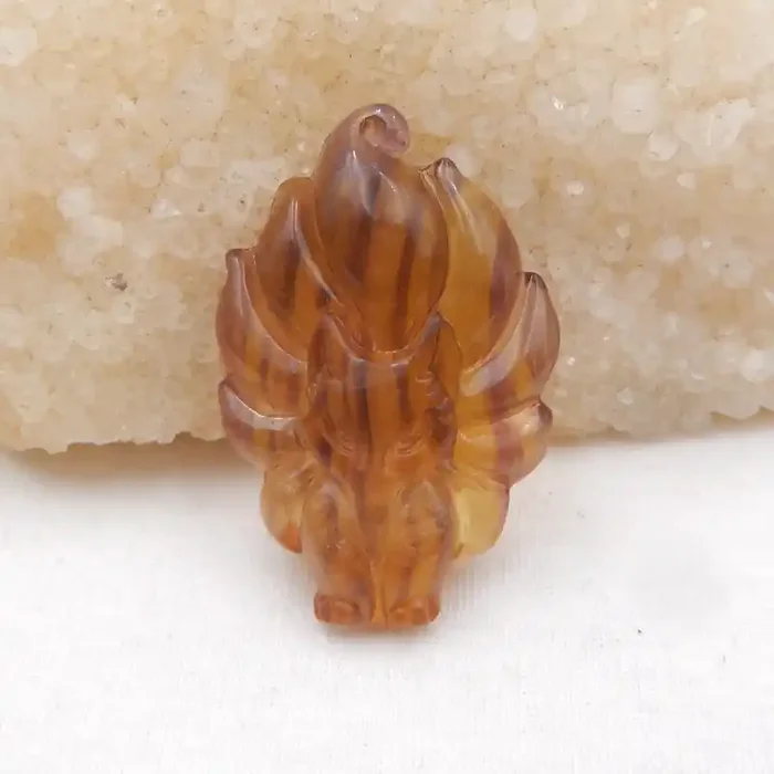 i116 – 98.5cts Carved Natural Fluorite Fox Pendant Front Driled