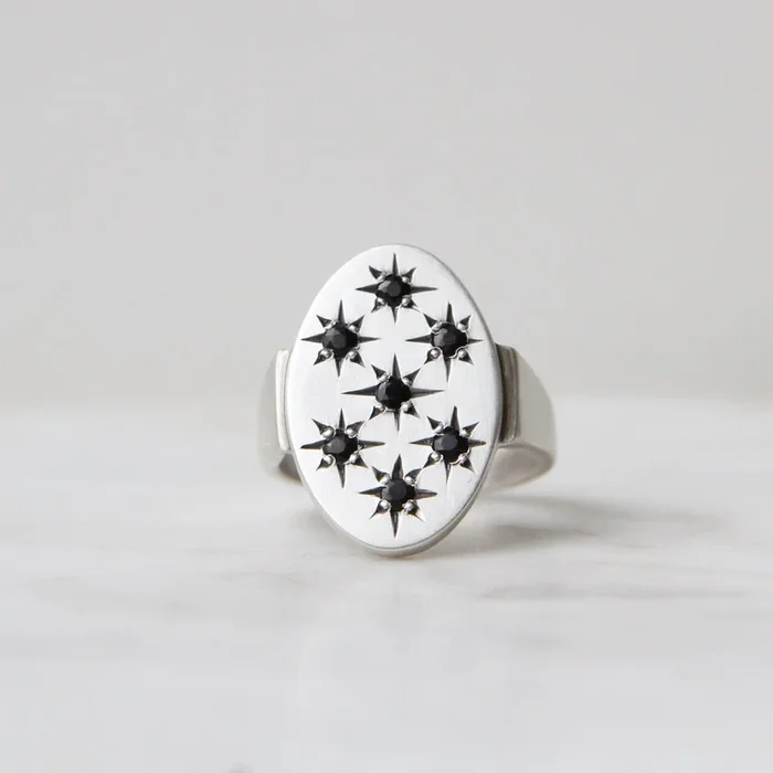 Large Oval with 7 Star Set Black Onyx Ring