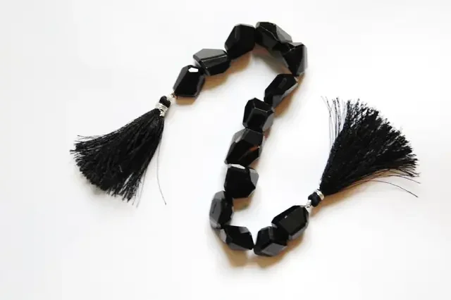 Large Superb AAA Irregular cut Black Spinel beads 337.5ct