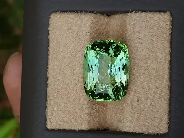 Light blue to green 17.73 carats. Spectacular color.