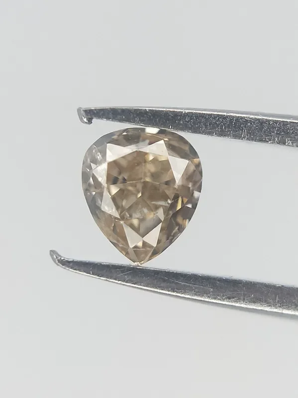Light Yellow Diamond , Pear Brilliant cut 0.11 cts ,